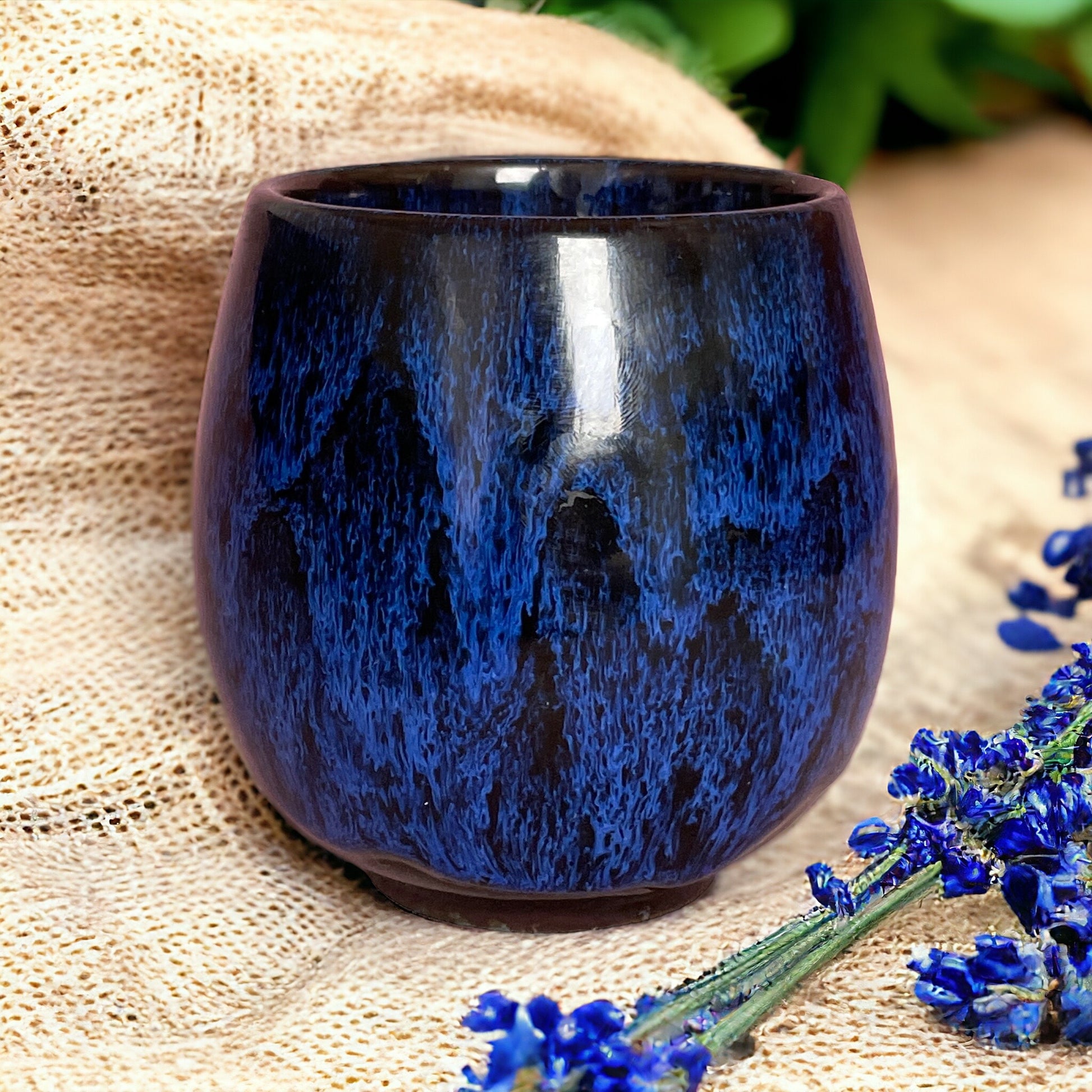 Reusable ceramic coffee cup from Reset & Unwind candle, eco-friendly, dishwasher safe, and sustainable