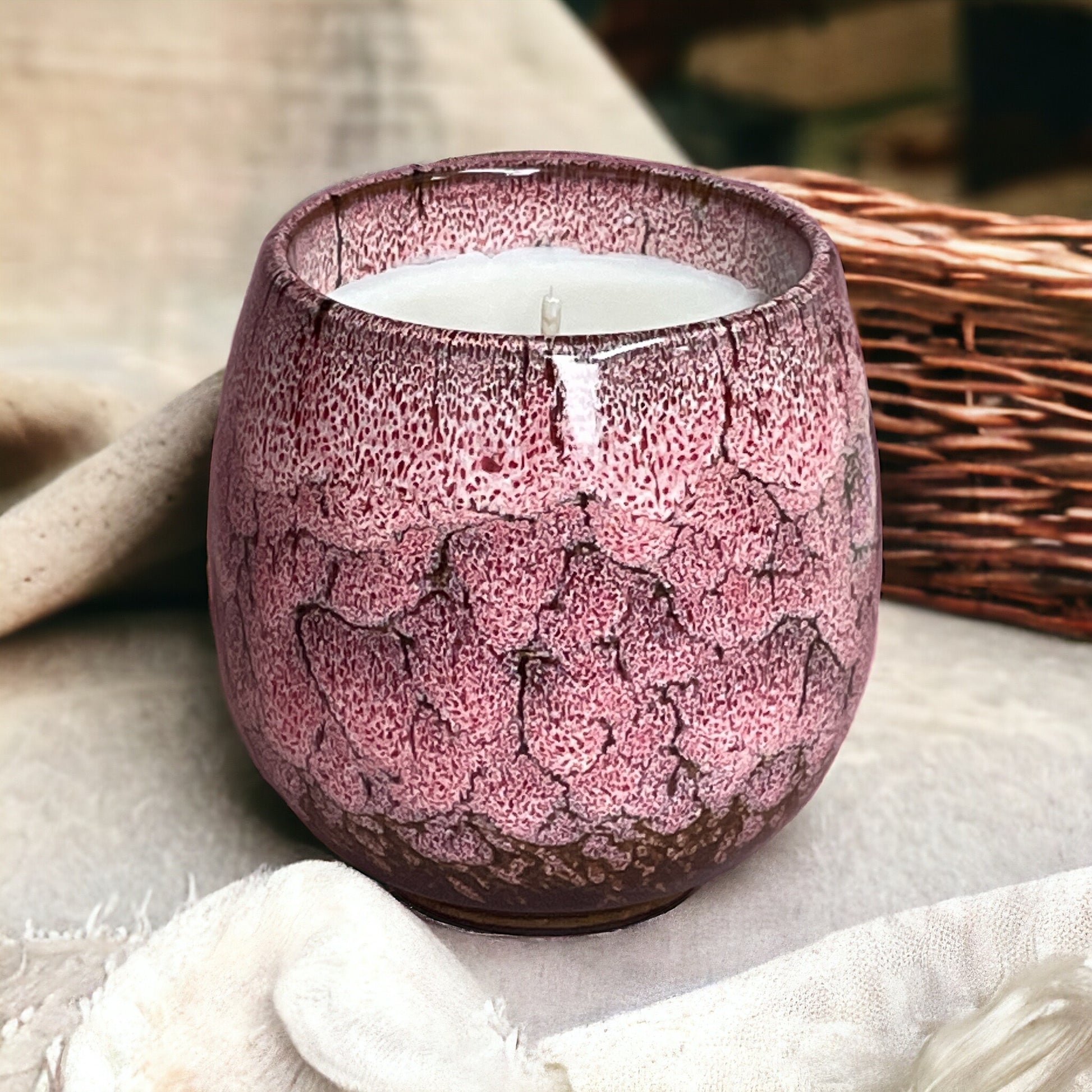 Relax & Renew lavender aromatherapy candle in a cozy setting, ideal for creating a peaceful, calming atmosphere.