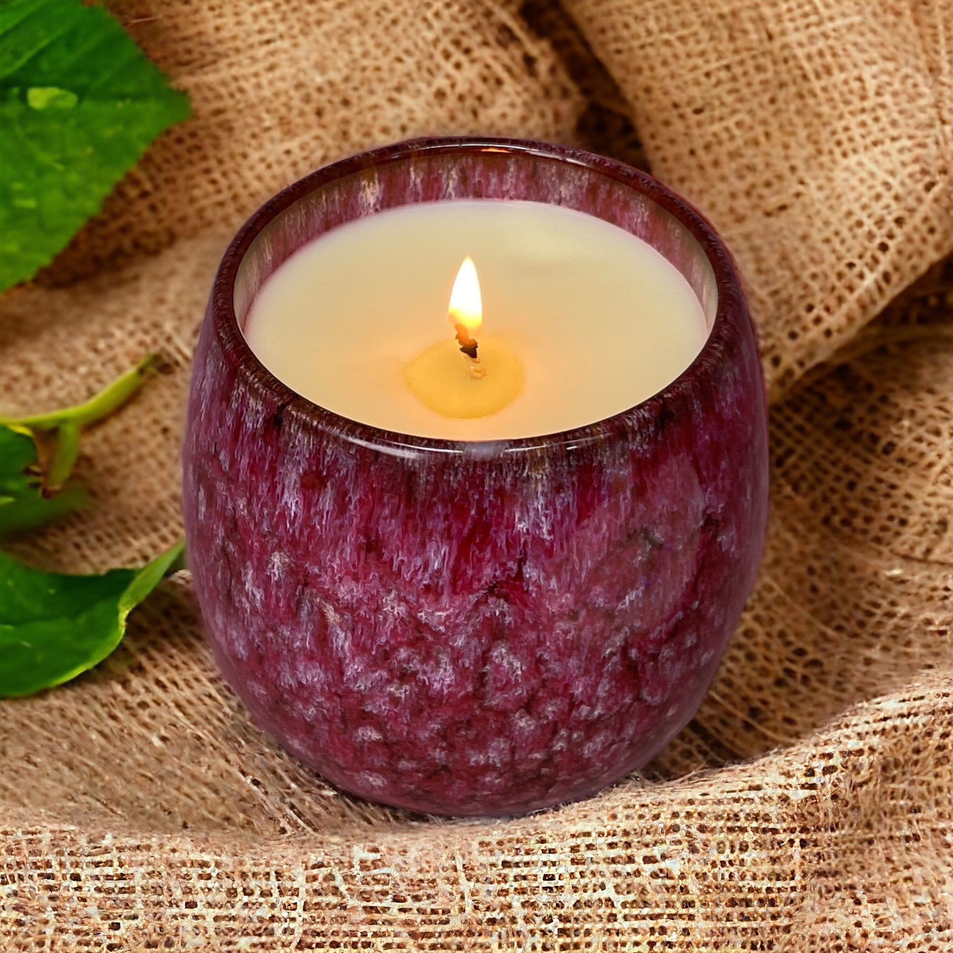 Renewed Vitality natural aromatherapy candle for energy, focus, and emotional uplift in ceramic coffee cup