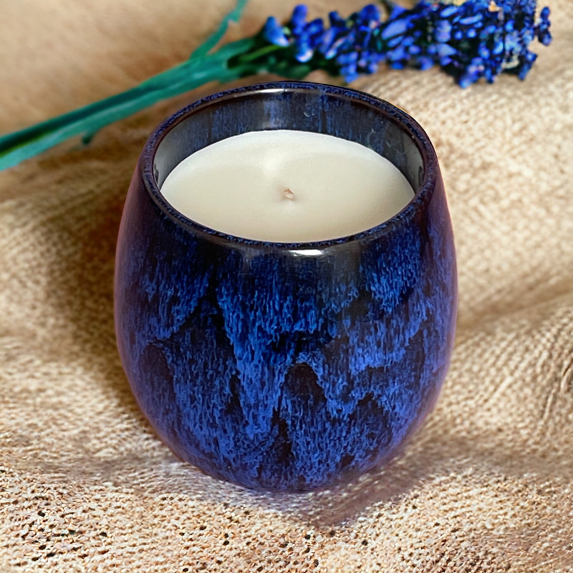 Reset & Unwind aromatherapy candle in a reusable coffee cup, natural and calming for stress relief and relaxation