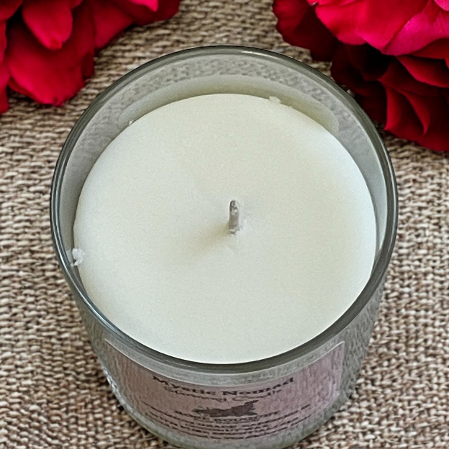 Top view of the Rose Bouquet candle, featuring creamy coconut and rapeseed wax with a gentle cotton wick, infused with floral rose geranium essential oils.