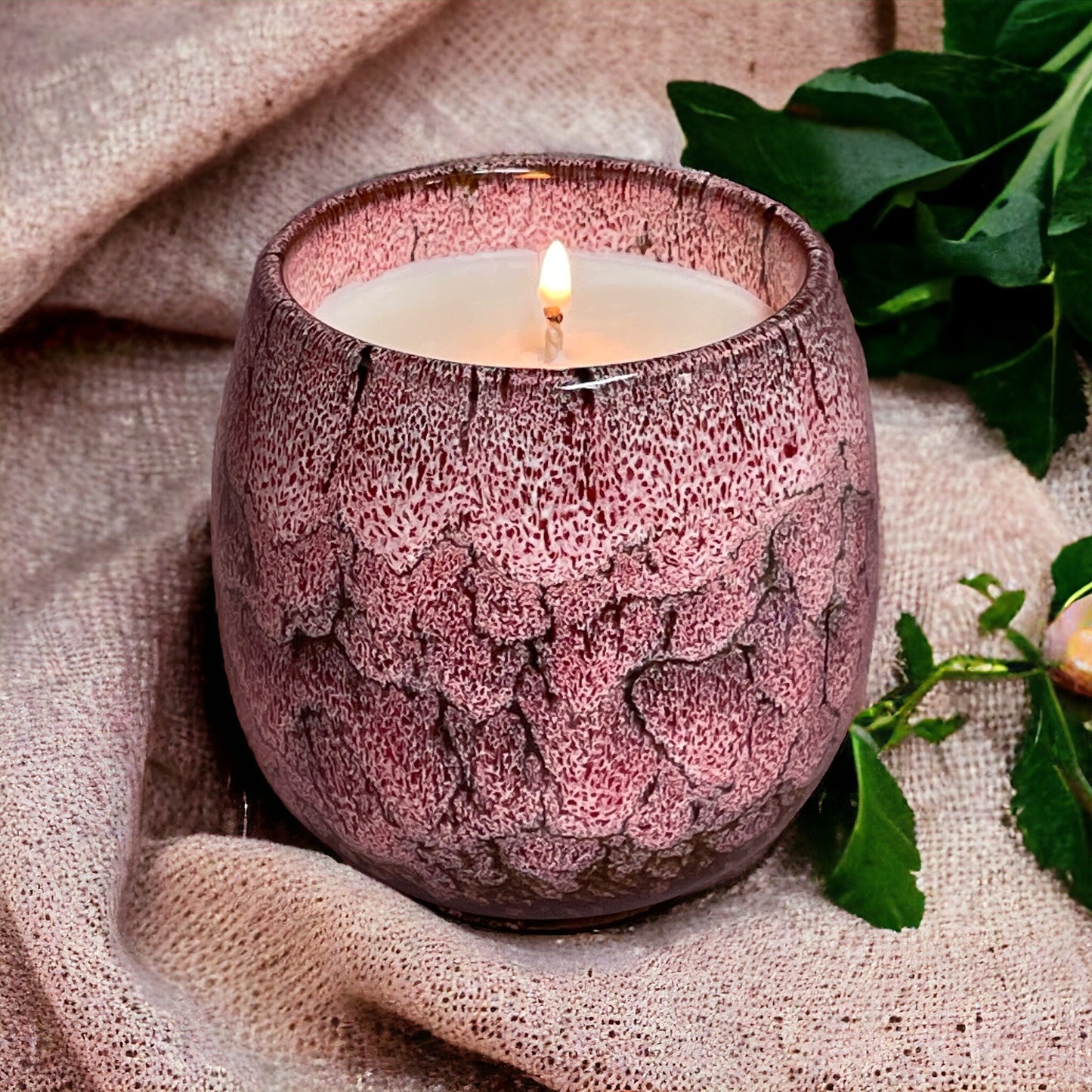 Lit Relax & Renew lavender aromatherapy candle in reusable ceramic coffee cup, promoting calm and relaxation