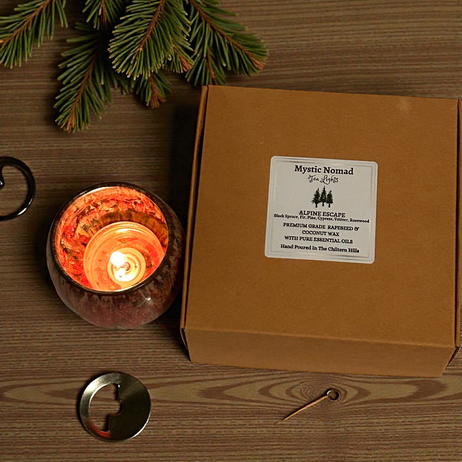 Single Alpine Escape aromatherapy tea light with essential oils in ceramic holder, infused with essential oils for mindful relaxation