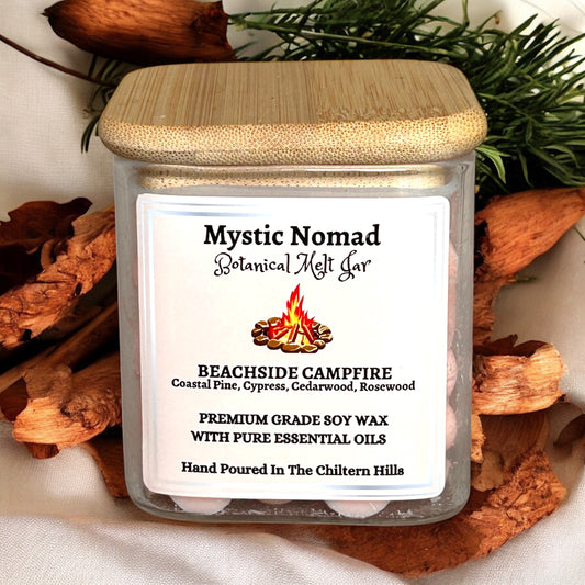 Eco-friendly wax melts in a glass jar with gold lid, showcasing coastal-inspired aromatherapy blend