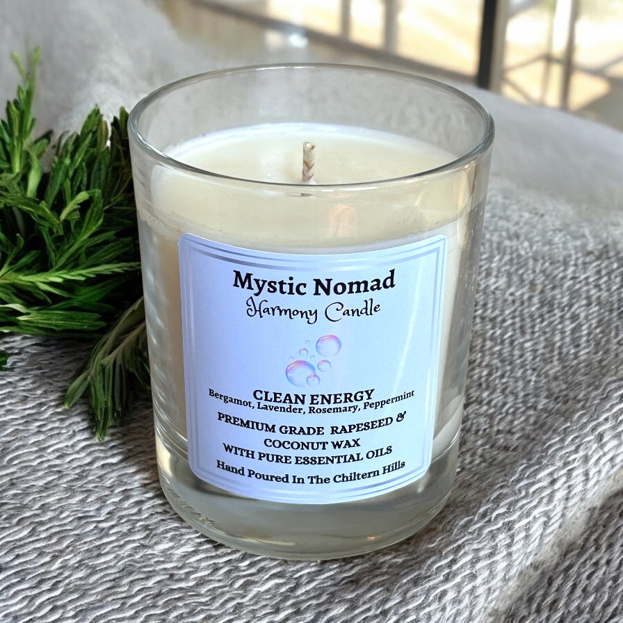 Clean Energy candle without the lid, showcasing the cotton wick and essential oil wax blend.