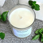 Top view of the Clean Energy aromatherapy candle showing the centred cotton wick and creamy natural wax.
