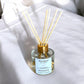 Clean Energy aromatherapy diffuser with natural reeds inserted, filling your home with refreshing essential oils for mental clarity and stress relief