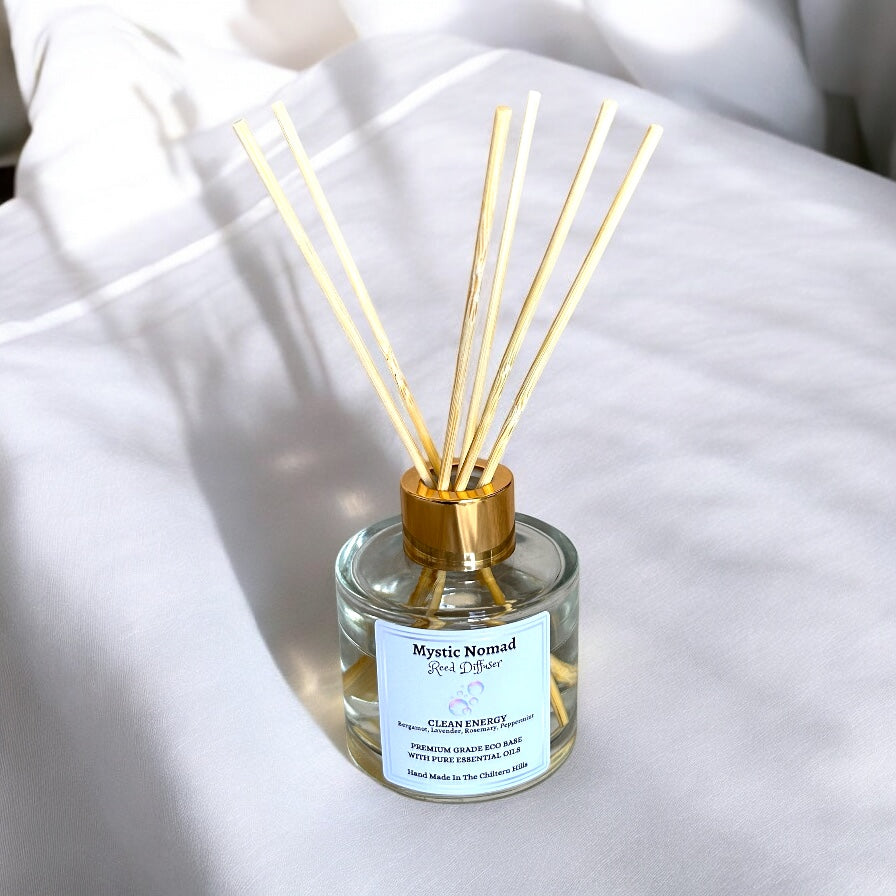 Clean Energy aromatherapy diffuser with natural reeds inserted, filling your home with refreshing essential oils for mental clarity and stress relief