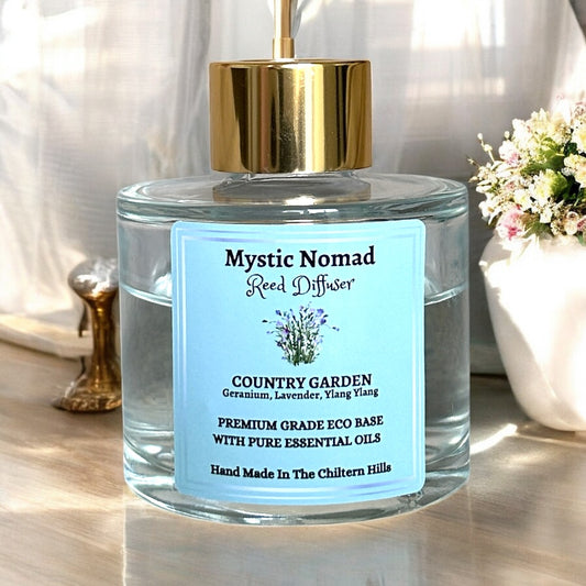 Country Garden aromatherapy reed diffuser with geranium, lavender, and ylang ylang essential oils in a luxury Italian glass jar
