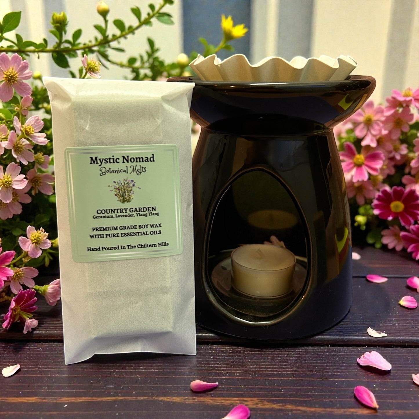 Country Garden wax melt snap bar displayed with a wax melt burner, creating a calming botanical scent experience for relaxation and clarity