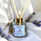 Elevated view of Dream Mist reed diffuser with reeds inserted, hand-poured by Mystic Nomad Aromatherapy to fill your home with a calming floral-herbaceous aroma for mindfulness and relaxation