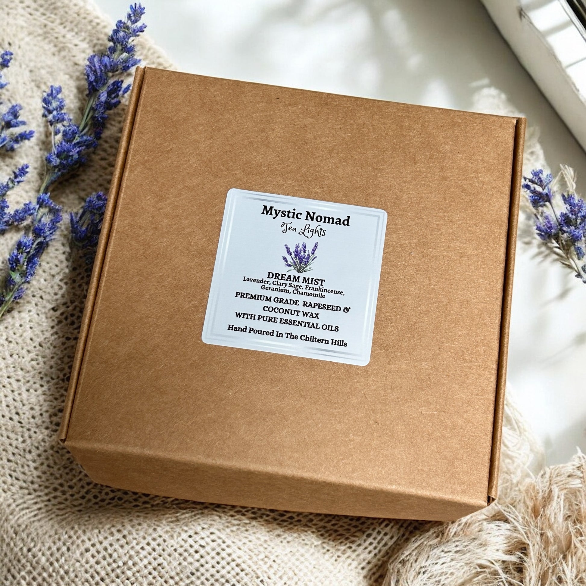 Box of 9 Dream Mist aromatherapy tea lights by Mystic Nomad, infused with essential oils for restful sleep and relaxation.