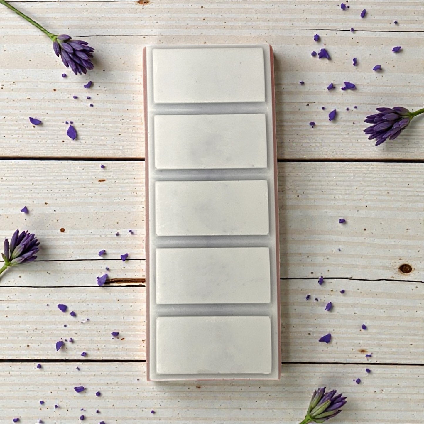 Close-up of Dream Mist aromatherapy wax melt snap bar, hand-poured with lavender and chamomile essential oils for mindfulness and calm.