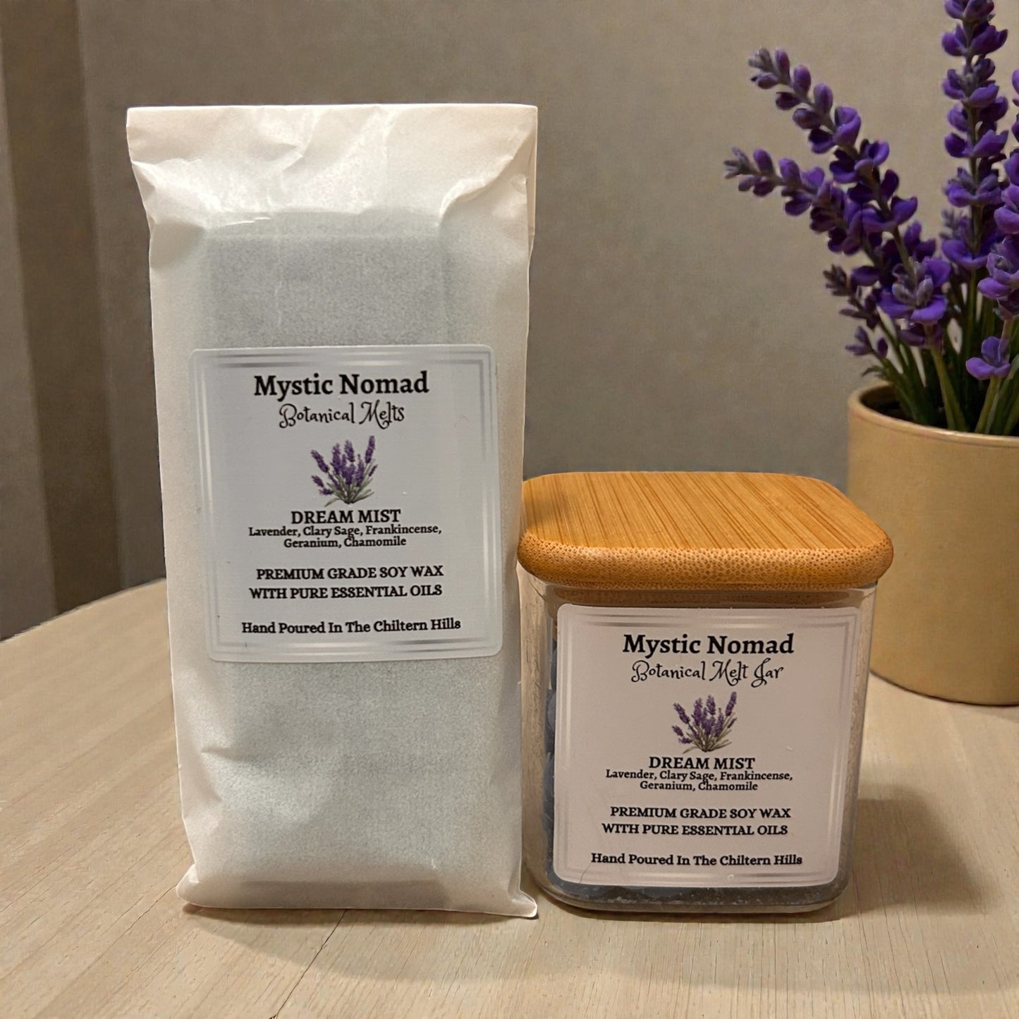 Dream Mist aromatherapy wax melt snap bar next to matching wax melts jar, both infused with calming lavender and chamomile essential oils.