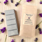 Dream Mist aromatherapy wax melt snap bar displayed alongside its eco-friendly packaging, crafted for stress relief and restful sleep.
