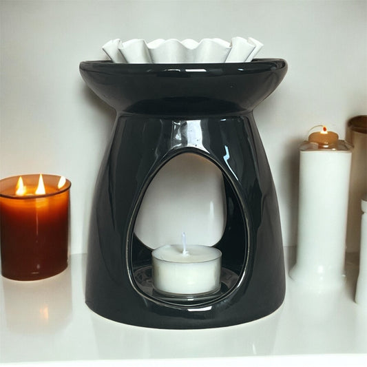 Luxury wax melt burner with tealights, enhancing aromatherapy candle and essential oil experience.