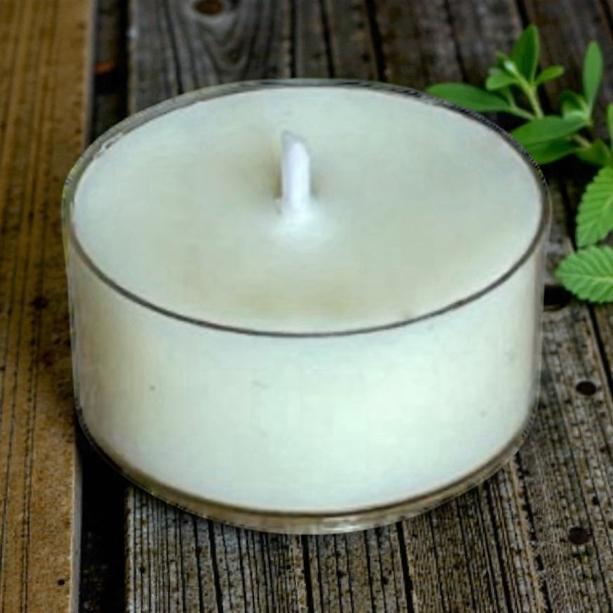 Close up of Clean Energy aromatherapy tea light made with natural wax and pure essential oils