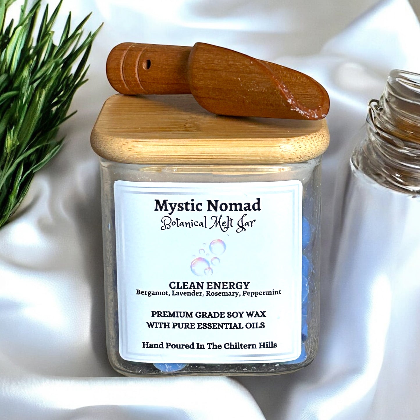 Mystic Nomad Clean Energy aromatherapy wax melts in luxury Italian glass jar with bamboo lid, infused with bergamot, lavender, rosemary, and peppermint for natural home refresh