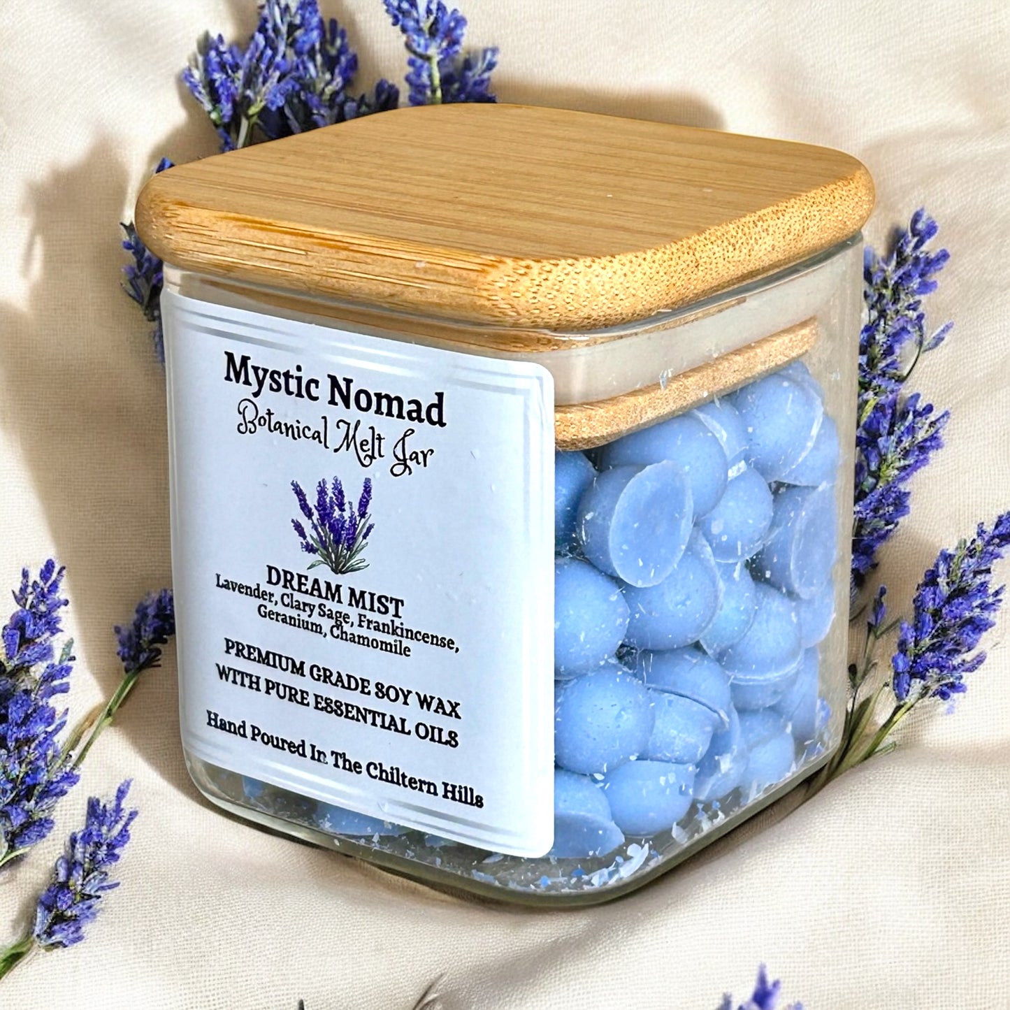 Side view of Dream Mist botanical wax melts jar showing gold lid and eco-luxe design