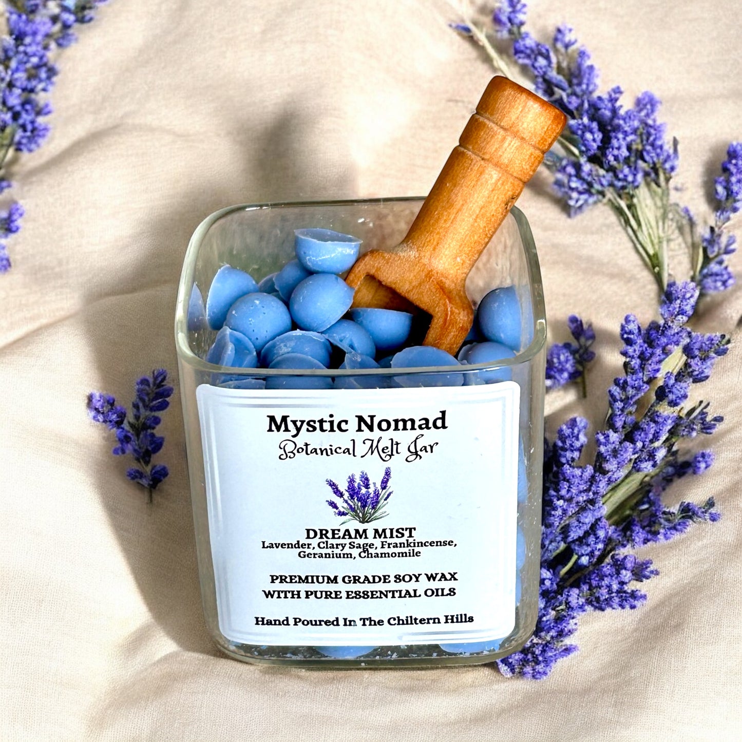Open jar of Dream Mist botanical wax melts showing natural soy melts inside