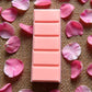 A flat lay of the Rose Bouquet aromatherapy wax melt by Mystic Nomad, featuring a floral rose geranium scent. Natural, hand-poured eco-friendly wax melt.
