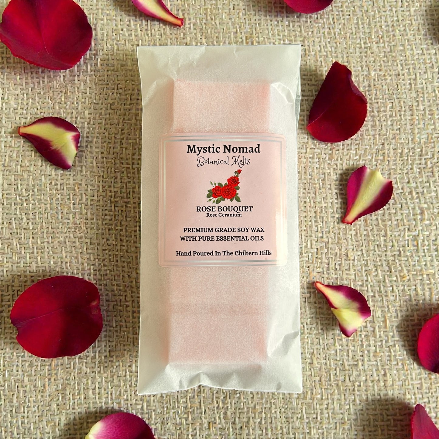 Rose Bouquet aromatherapy wax melt in eco-friendly packaging by Mystic Nomad. Hand-poured floral wax melt made with pure rose geranium essential oil.