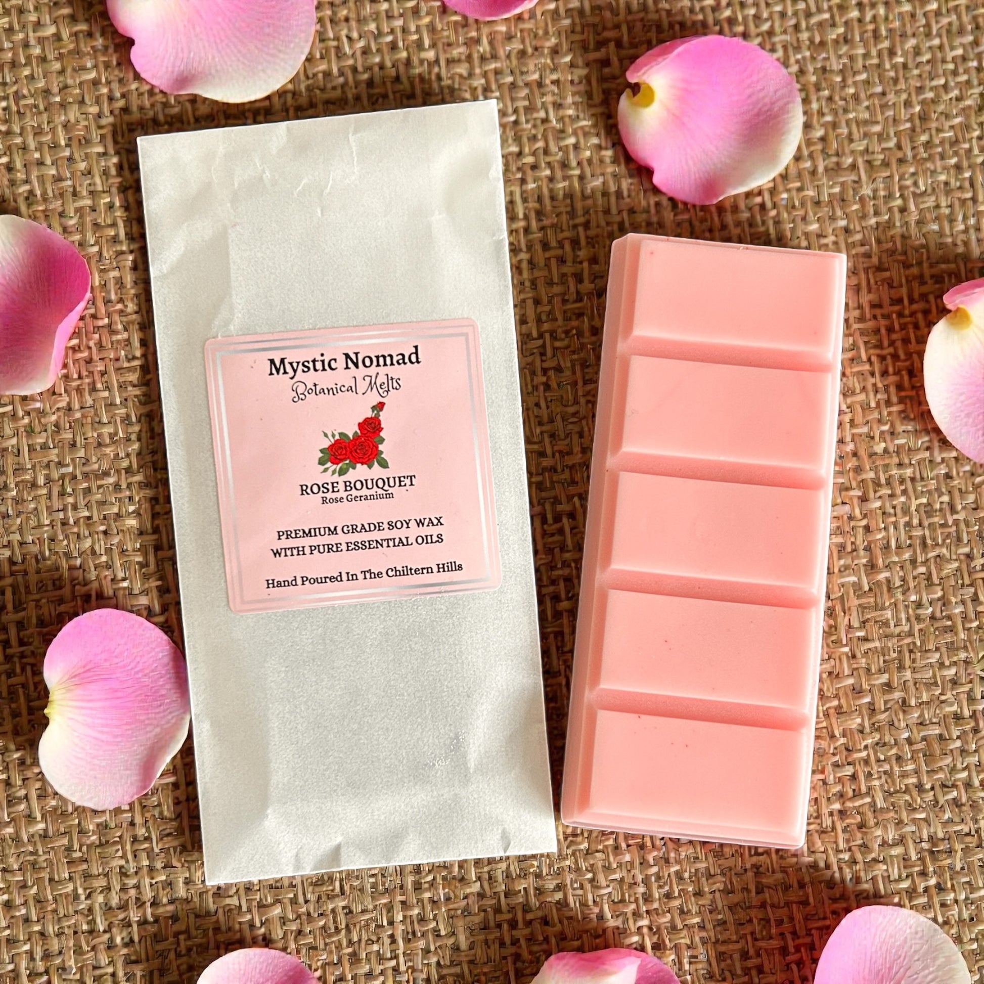 Rose Bouquet wax melt displayed beside its packaging. A natural aromatherapy wax melt by Mystic Nomad, scented with calming rose geranium.


