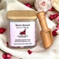 Lifestyle image of Mystic Nomad Rose Bouquet aromatherapy wax melts on wooden surface with rose petals and soft lighting, creating a calm, floral, and romantic atmosphere.