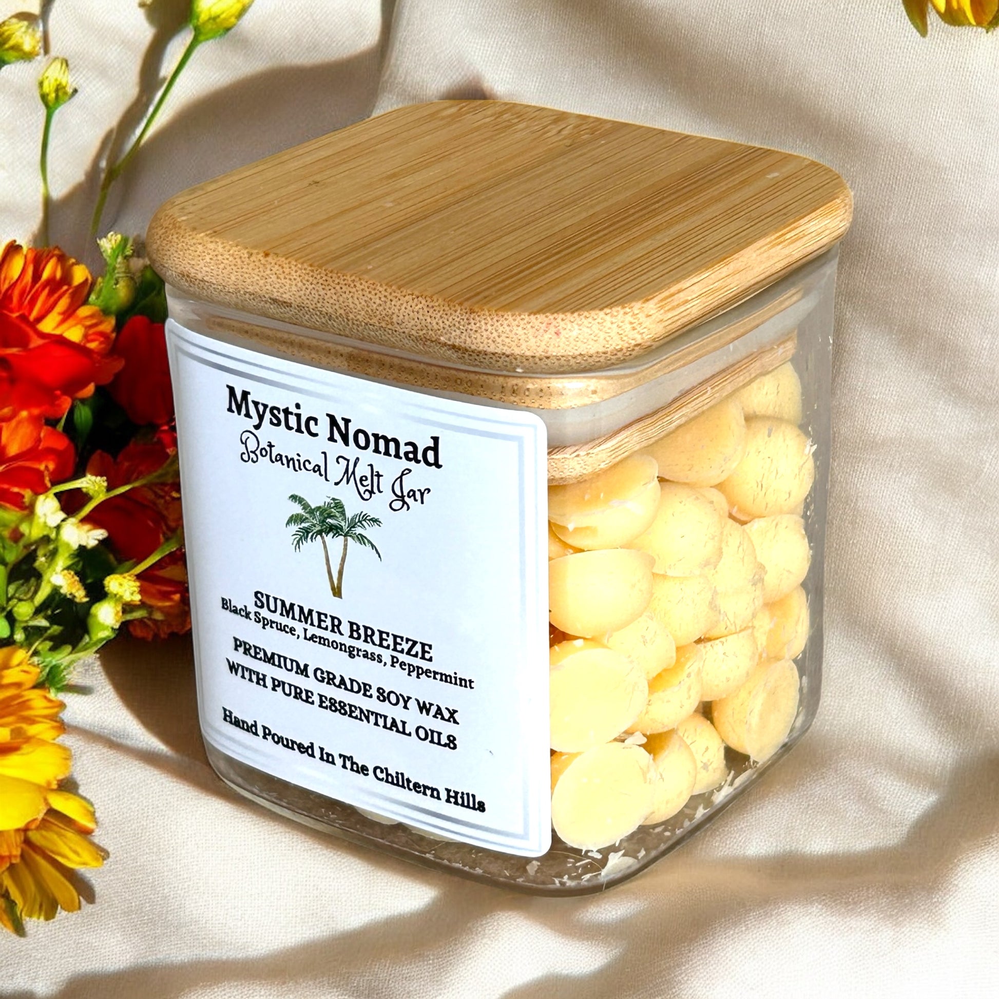 Side view of Mystic Nomad Summer Breeze botanical wax melts showing jar details