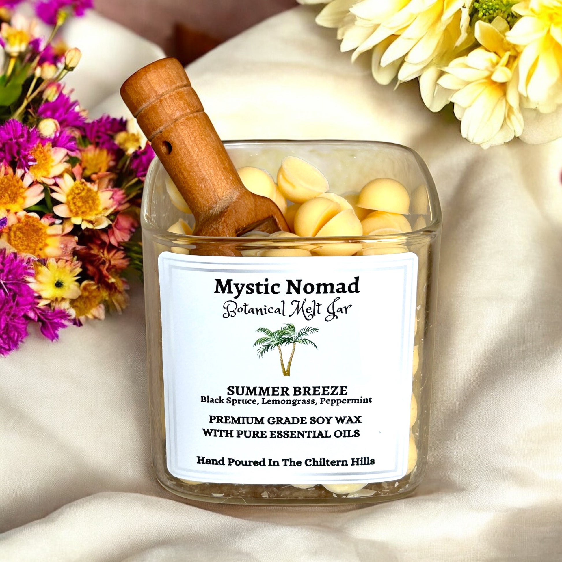 Open jar of Mystic Nomad Summer Breeze wax melts showing individual melts