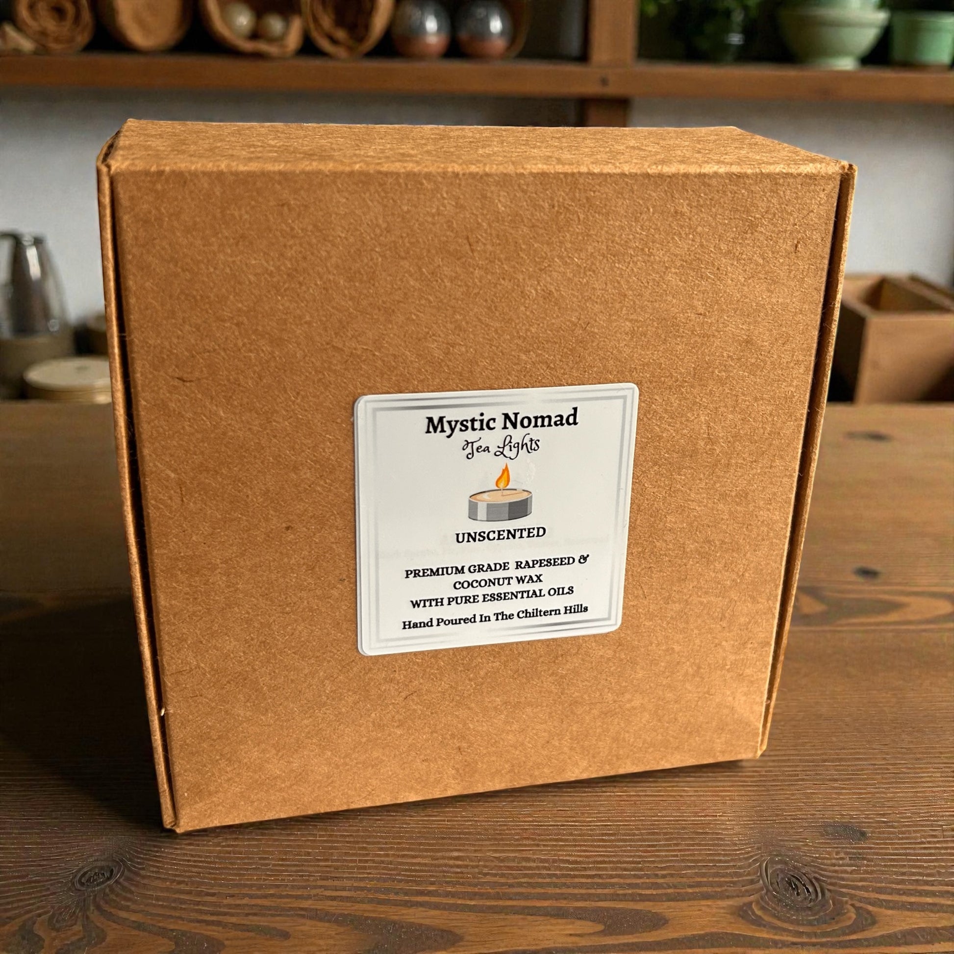 Eco kraft box of Mystic Nomad Aromatherapy unscented tea lights standing upright for display.