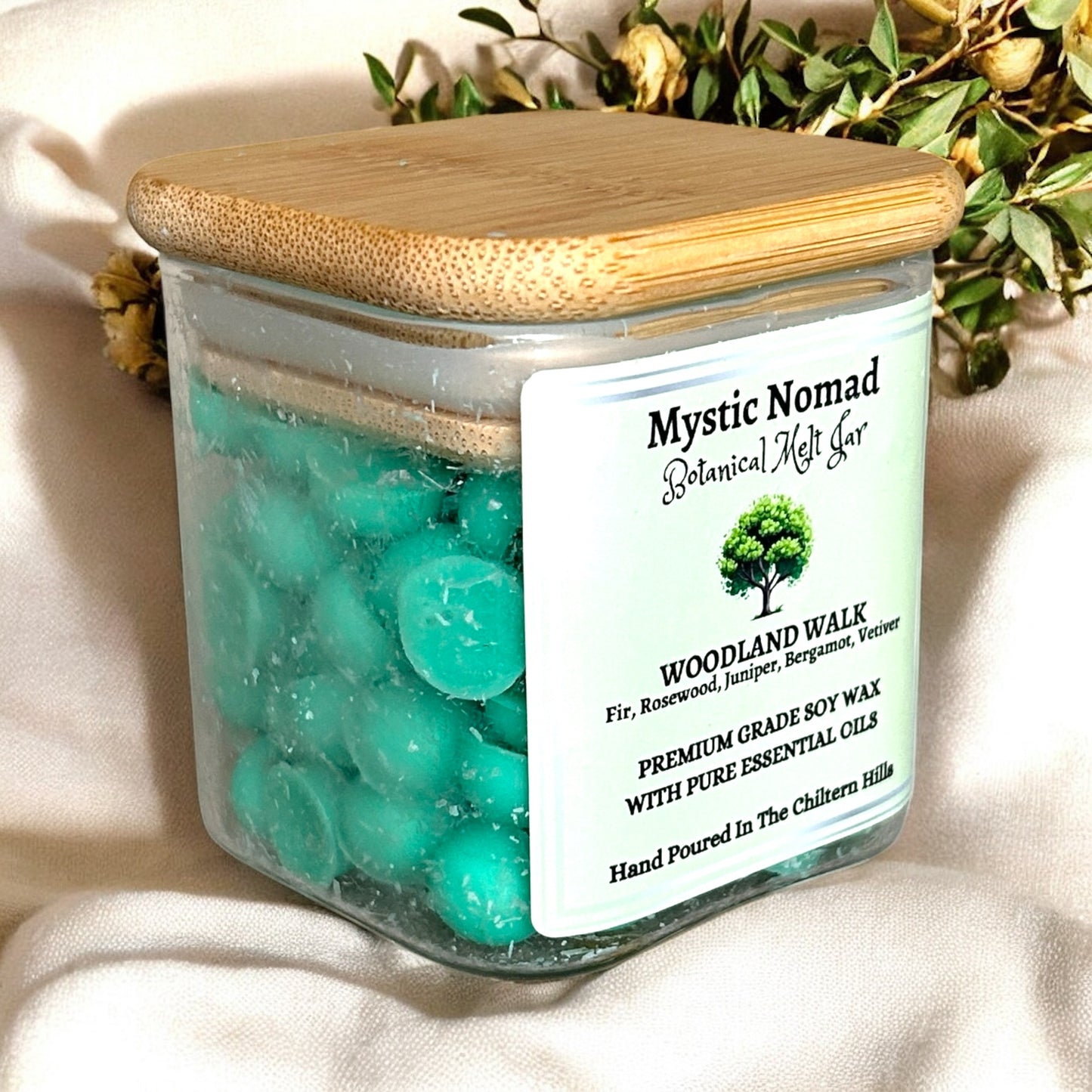 Left-side view of Mystic Nomad Woodland Walk botanical wax melts jar showing eco-luxe bamboo lid