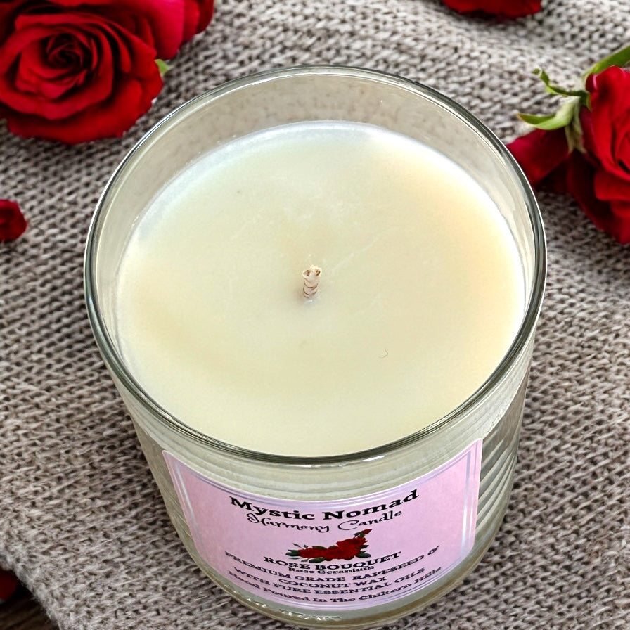 Top view of Rose Bouquet aromatherapy candle, showing unlit cotton wick and natural floral wax surface.