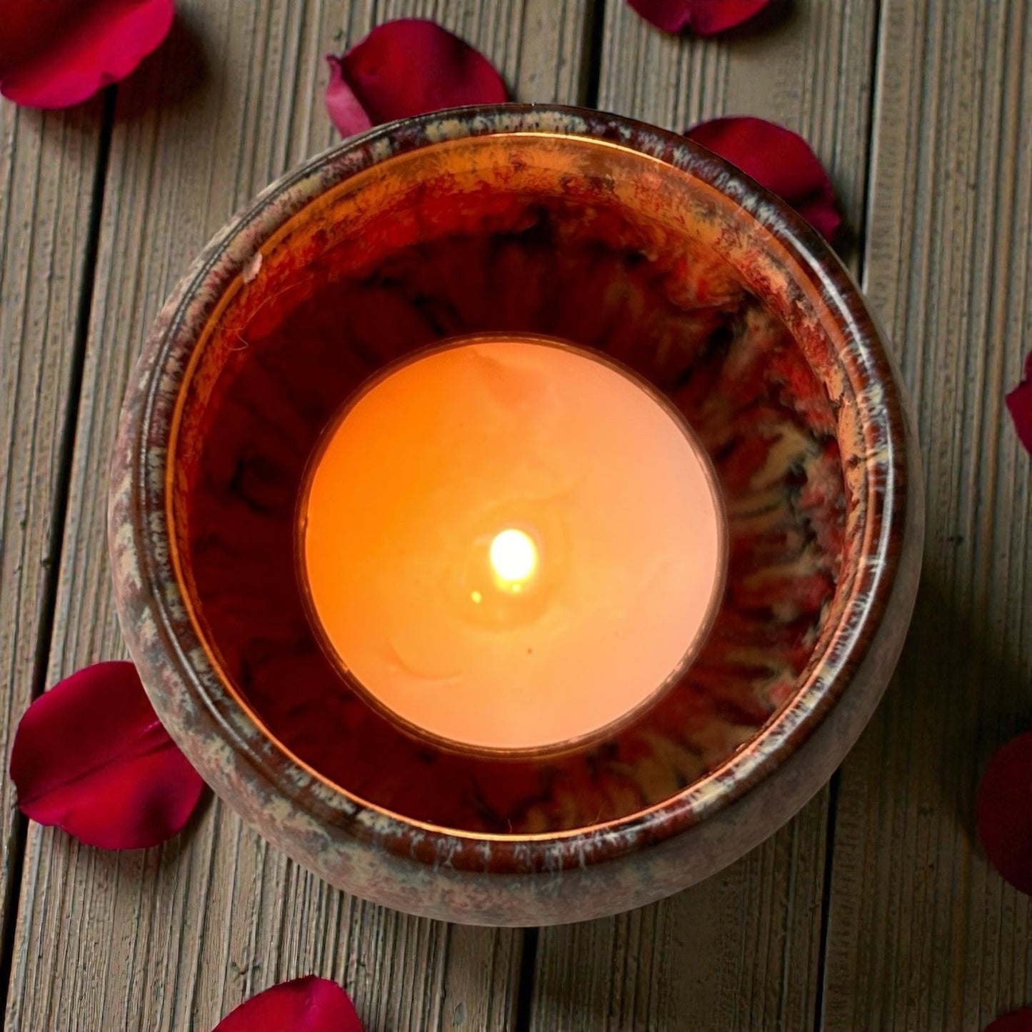 Rose Bouquet aromatherapy tea light burning in ceramic holder with floral scent