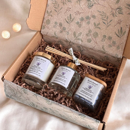 “Aromatherapy subscription box with seasonal candle and natural self-care products from Mystic Nomad