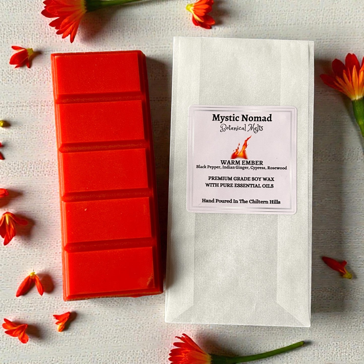 Warm Ember aromatherapy wax melt snap bar in eco-friendly, compostable packaging by Mystic Nomad, perfect for zero-waste home aromatherapy rituals.