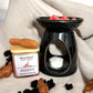 Warm Ember Botanical Wax Melt placed in burner, releasing a comforting, grounding aroma