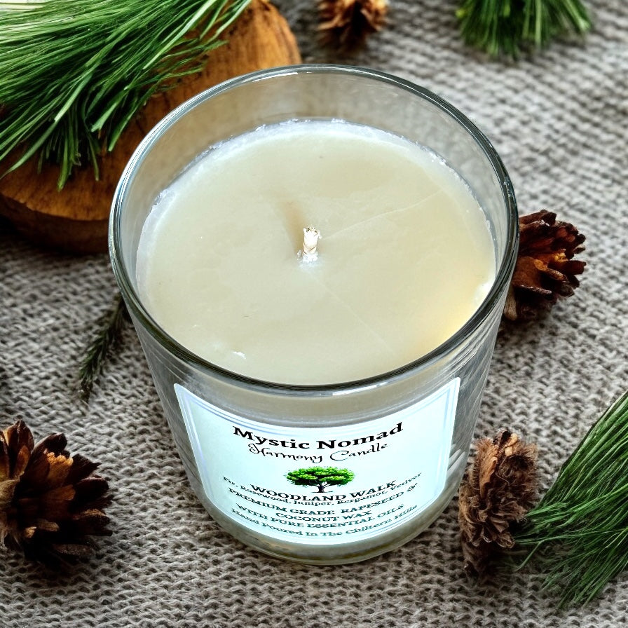 Top view of Woodland Walk aromatherapy candle, showing unlit cotton wick and natural wax surface.
