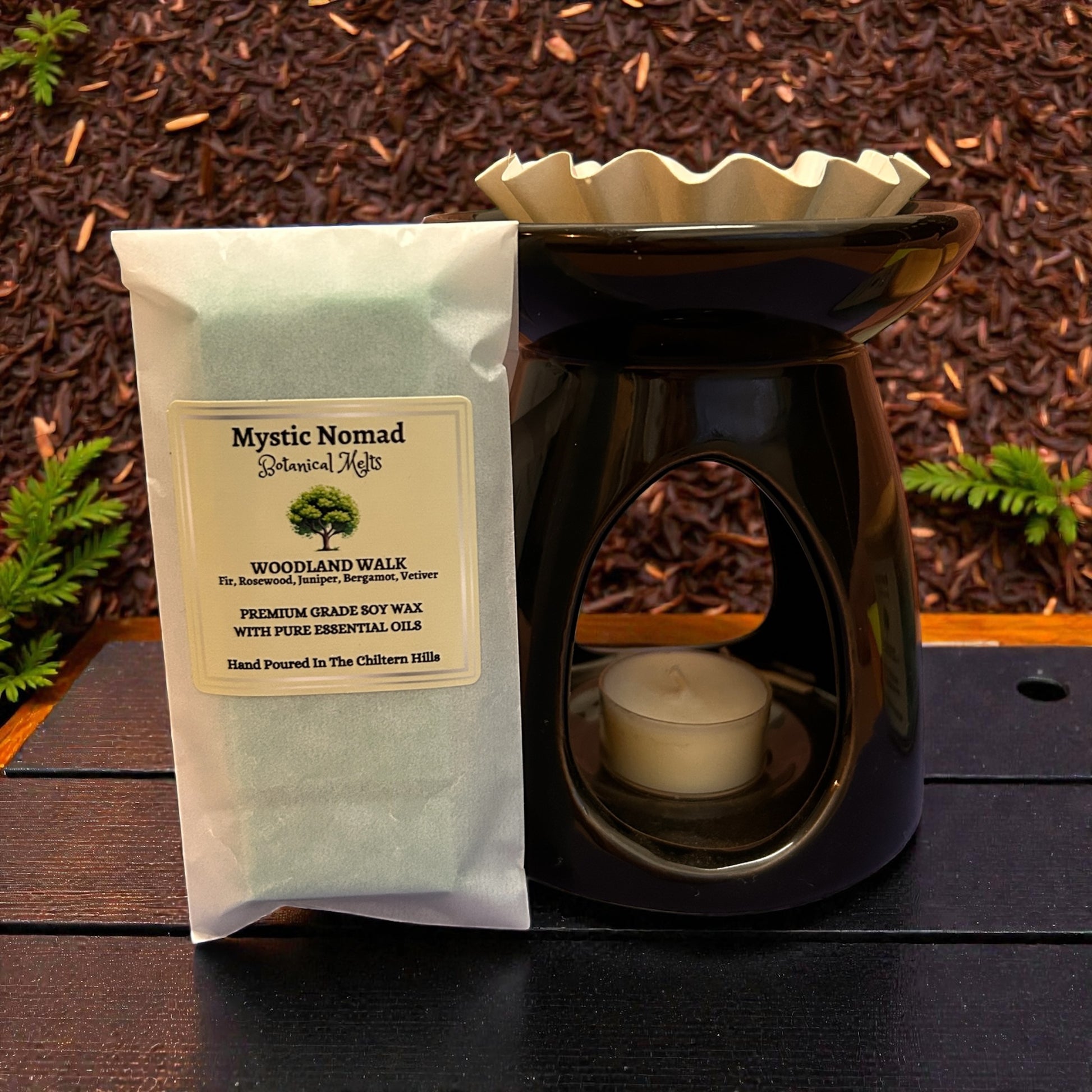 Woodland Walk aromatherapy snap bar displayed with wax melt burner, releasing a warm, earthy forest aroma into the home